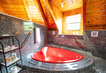 Unwind and Romance in a Bubble Bath Using the Heart-Shaped Tub